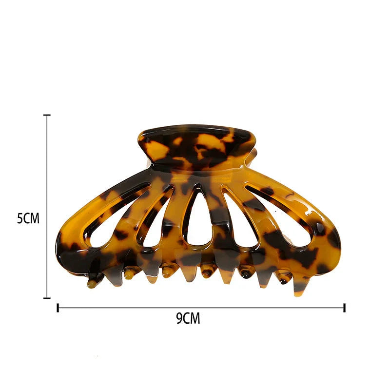 Stylish geometric hollow stripes barrettes in beige color, a fashionable hair accessory for women and girls