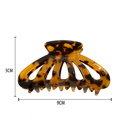 Stylish geometric hollow stripes barrettes in beige color, a fashionable hair accessory for women and girls