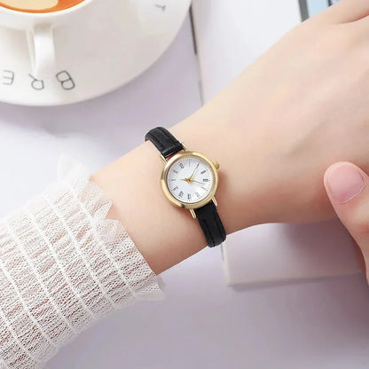 Elegant women's quartz leather wristwatch with a minimalist, timeless design