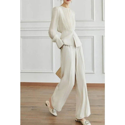 Elegant long sleeve top and wide leg pants set in solid color for stylish autumn wear
