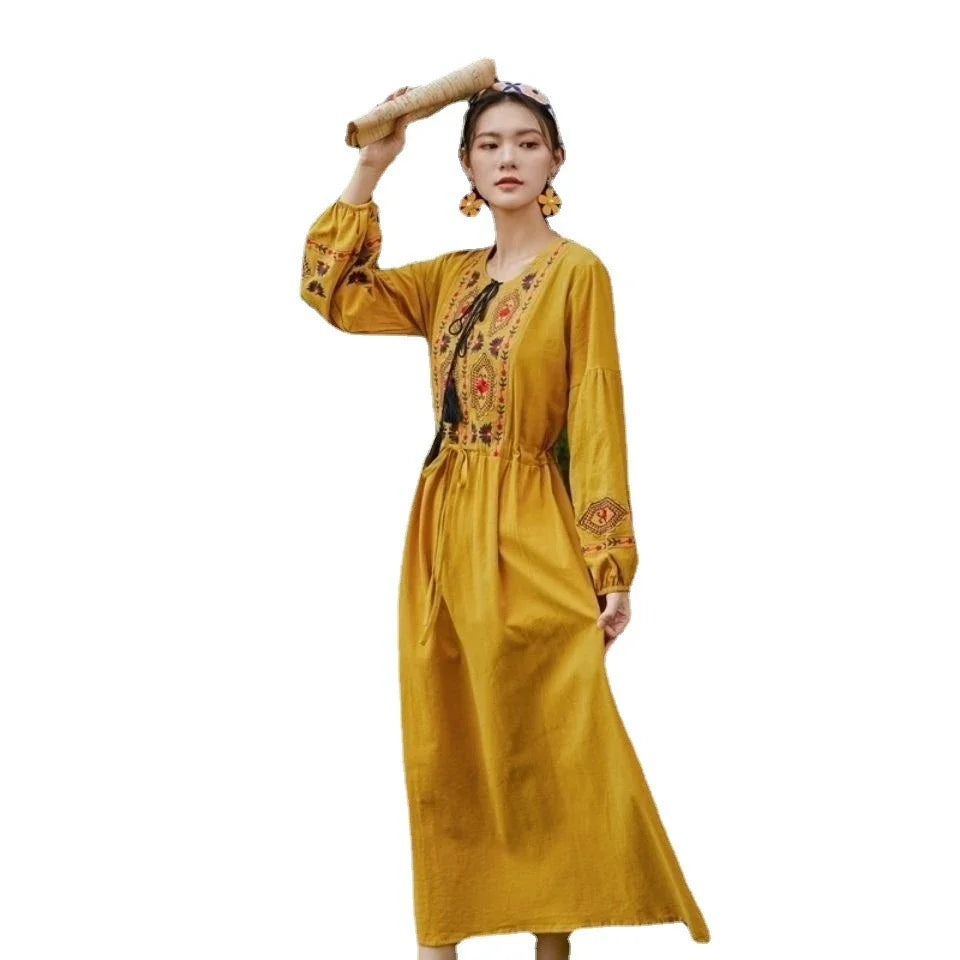 Elegant embroidered cotton-linen dress with tassels, featuring a waist-cinching A-line silhouette in vibrant colors