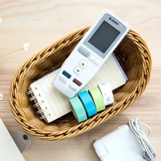 Bamboo handwoven storage basket organizer with natural, neutral tones and rustic design for organizing fruits, tea supplies, and more in the kitchen, living room, or bathroom.