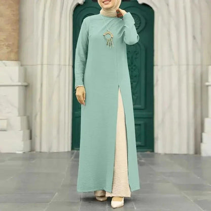 Elegant polyester dress with long sleeves, high slit hem, and available in caramel, black, blue, green, and pink colors