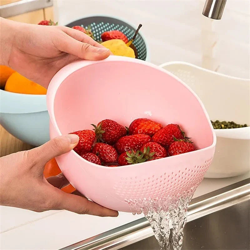 A multi-purpose kitchen drain basket with handles, made of high-quality polypropylene material for efficient draining and easy cleaning.