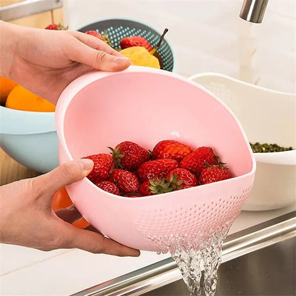 A multi-purpose kitchen drain basket with handles, made of high-quality polypropylene material for efficient draining and easy cleaning.