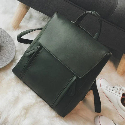 Versatile British-inspired shoulder bag made from high-quality PU leather with a spacious main compartment, convenient pockets, and an adjustable strap