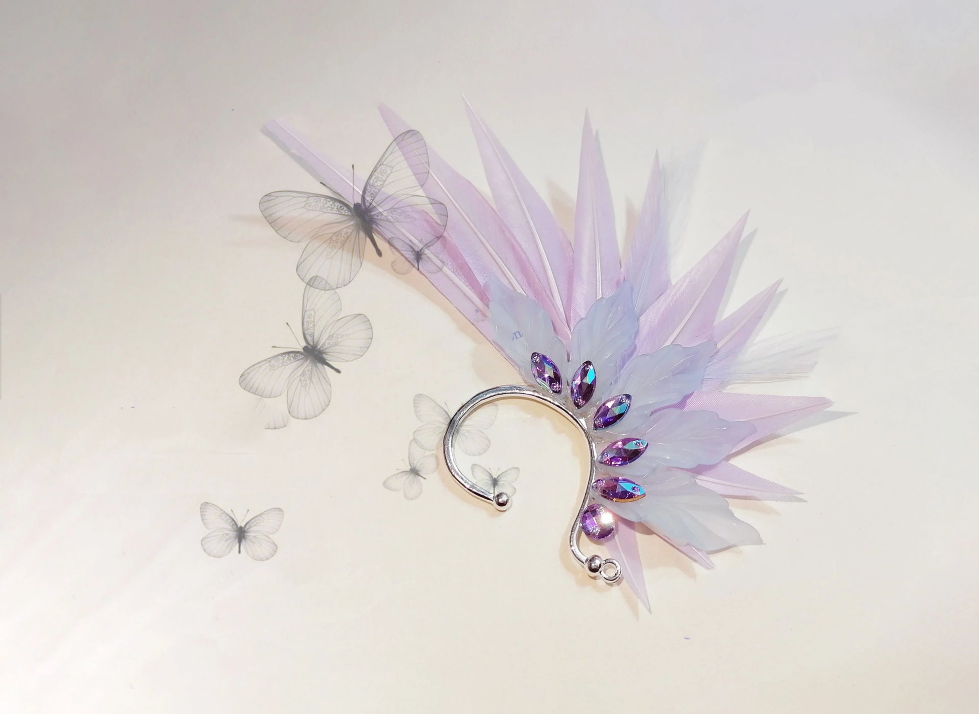 Elegant feather earrings with delicate angel wing design in various color options