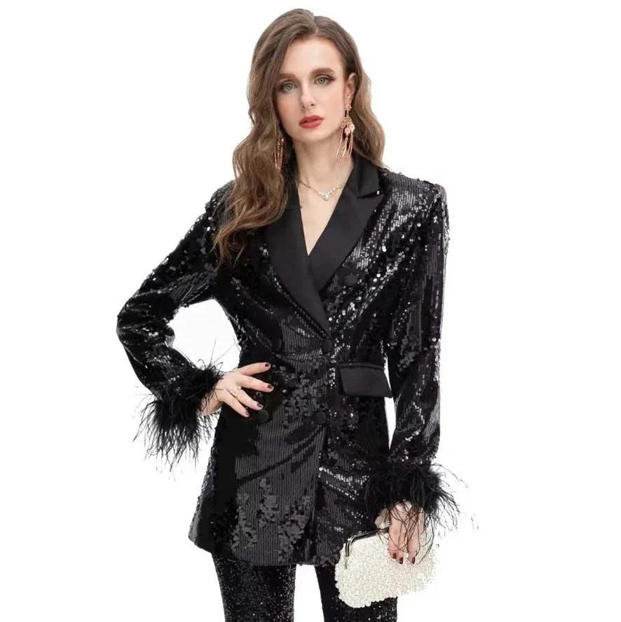 Elegant double-breasted blazer with feather and sequin details, offering timeless style and versatility for any occasion.