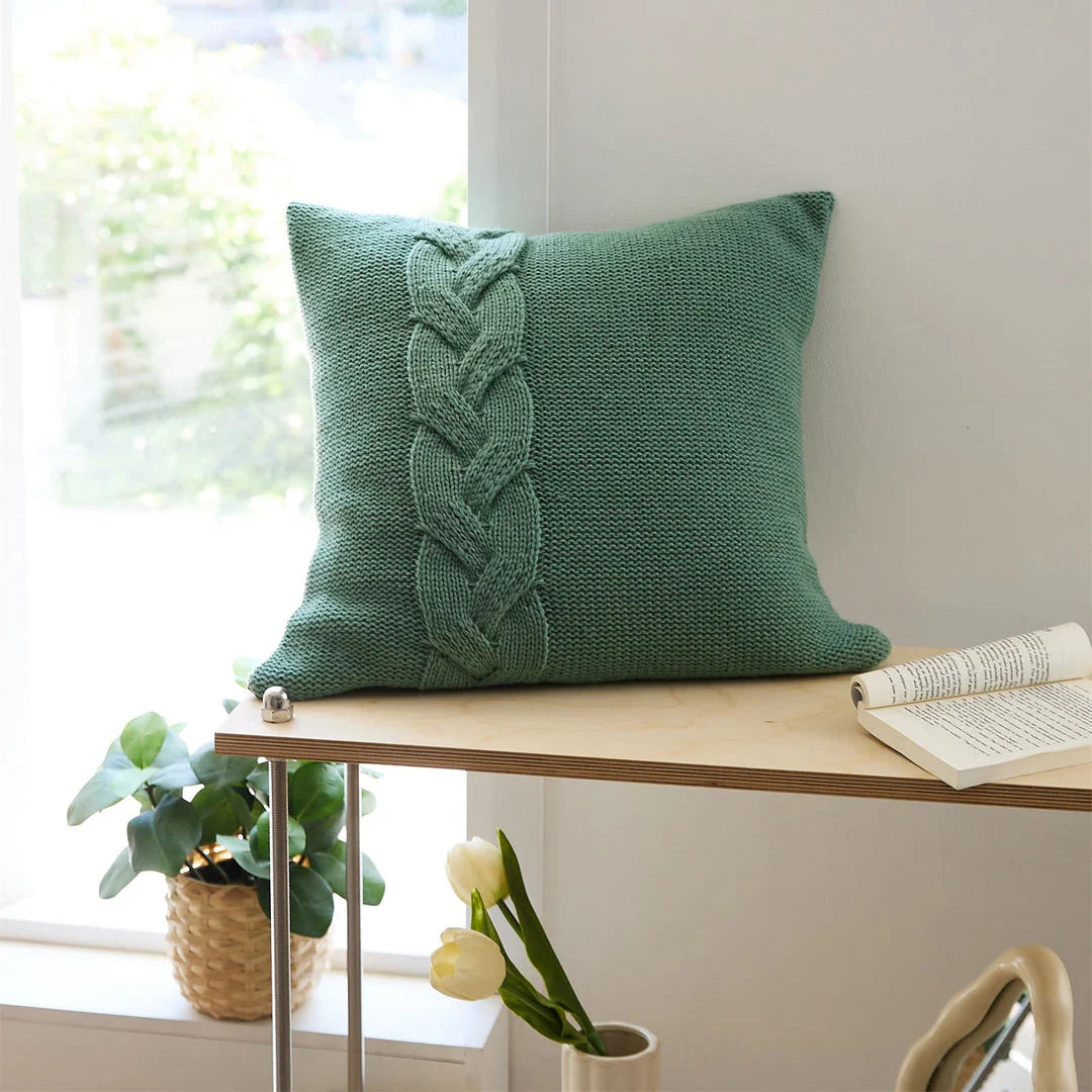 Cozy Nordic-inspired knit pillow cover with large twist design in multiple colors for stylish home decor