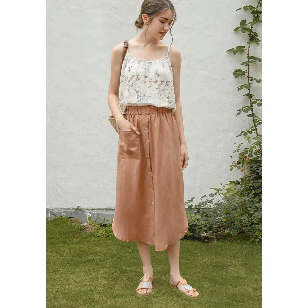 Elegant cotton linen maxi skirt with high waist, button-up front, and side split for a flowing, comfortable look