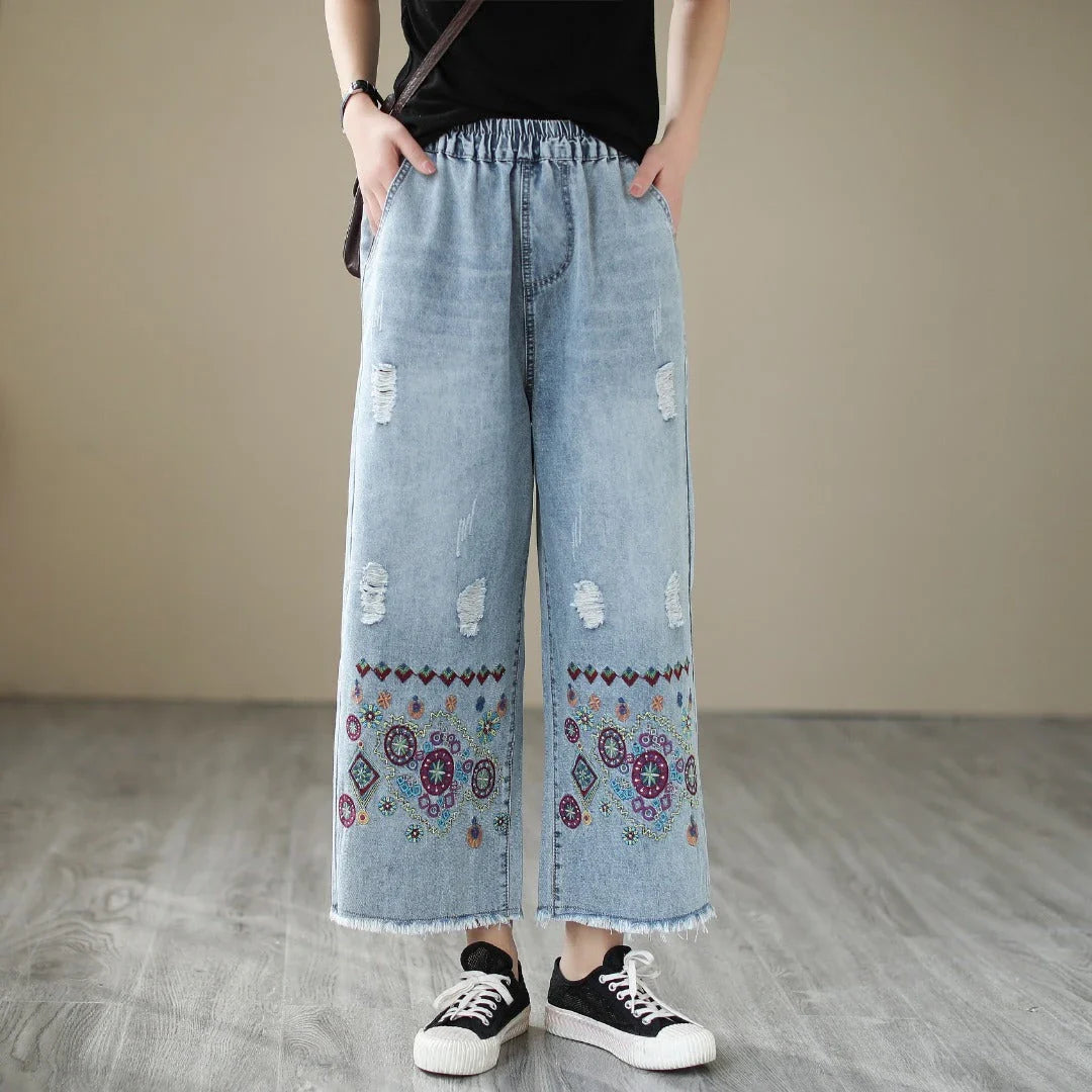 Fashionable embroidered ripped denim straight jeans with a relaxed yet flattering silhouette