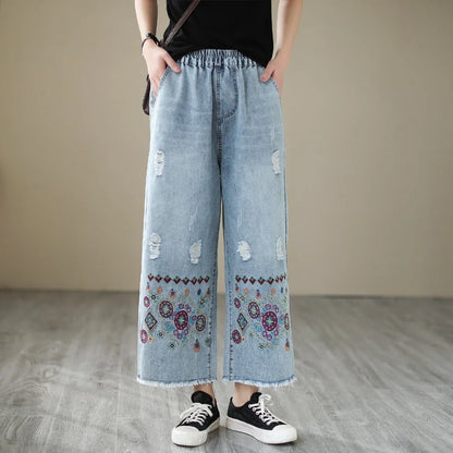 Fashionable embroidered ripped denim straight jeans with a relaxed yet flattering silhouette
