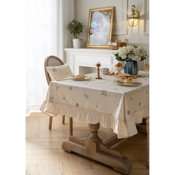 Elegant cotton tablecloth with apricot embroidery and lotus leaf edge, perfect for dining decor