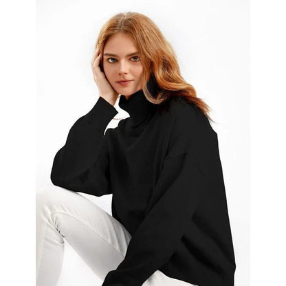 Chic and cozy oversized turtleneck sweater for women in a solid color, perfect for cold weather fashion and style