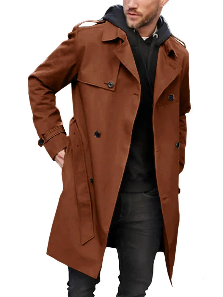 Stylish men's double-breasted trench coat in light gray color with slim fit silhouette