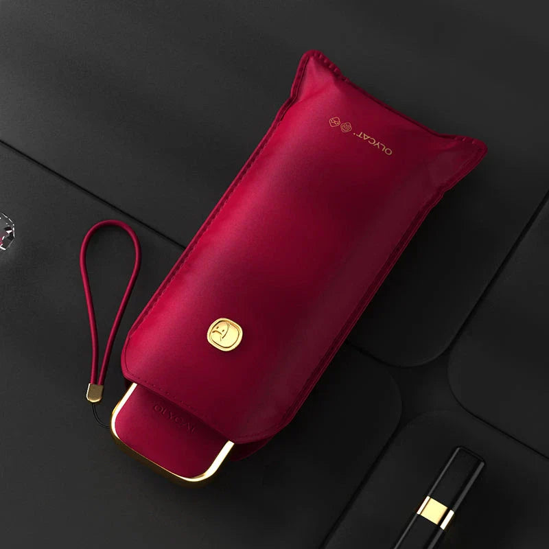 Chic and compact portable sun and rain umbrella in various colors, ideal for travel and outdoor events