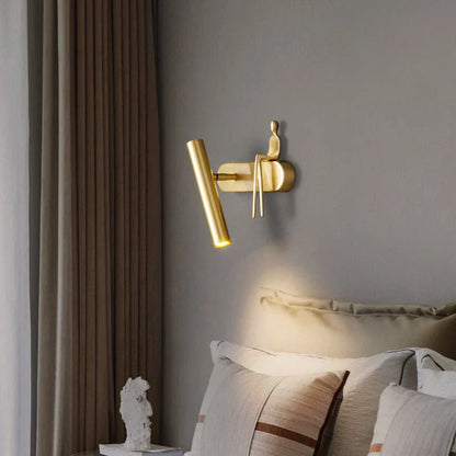 Stylish and versatile bedroom wall lamp with a sleek, postmodern design and a luxurious gold finish