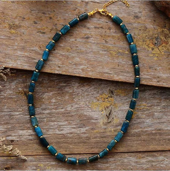 Elegant red natural stone necklace with an adjustable stainless steel chain, perfect for adding a touch of natural beauty to any outfit.