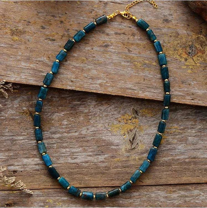 Elegant red natural stone necklace with an adjustable stainless steel chain, perfect for adding a touch of natural beauty to any outfit.