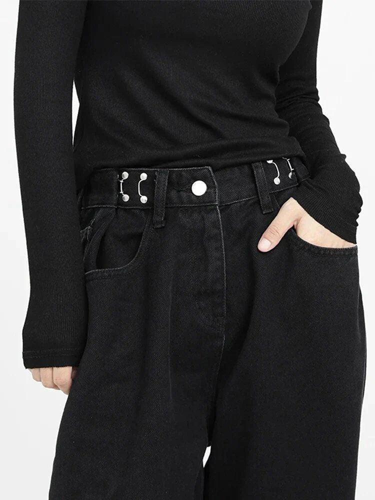 A pair of high-waist black jeans with a relaxed wide-leg design, perfect for effortless style and comfort.