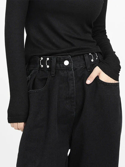 A pair of high-waist black jeans with a relaxed wide-leg design, perfect for effortless style and comfort.