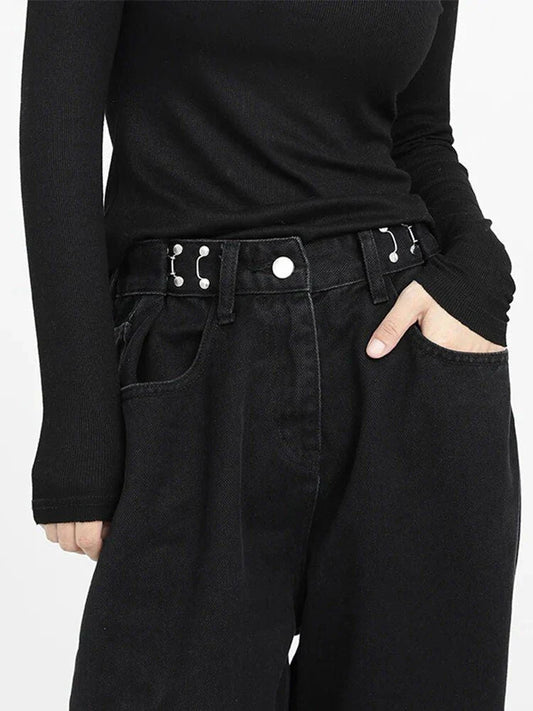 A pair of high-waist black jeans with a relaxed wide-leg design, perfect for effortless style and comfort.