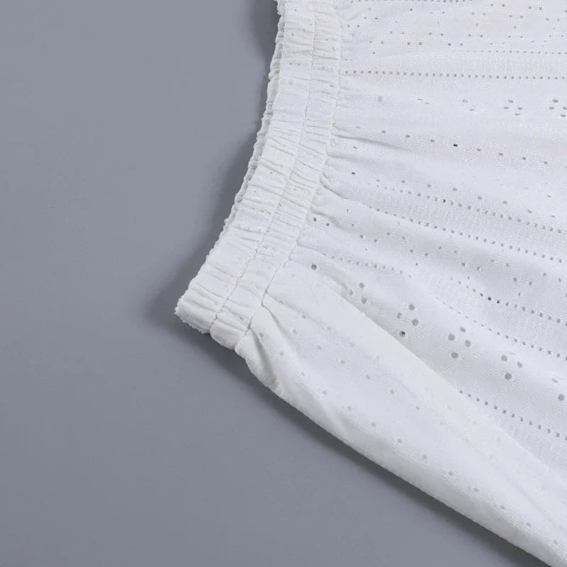 Trendha Women's Long Sleeve Pullover Top and Shorts Set in White, featuring a chic hollow-out design and flattering slim fit