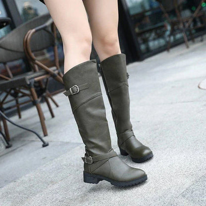 Stylish women's boots with low heels and a rounded toe, available in multiple colors and sizes