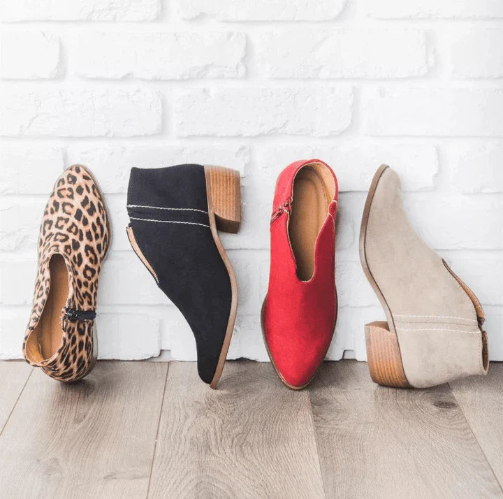Stylish leopard print leather booties with square toe and tassel accent for fashionable women's footwear
