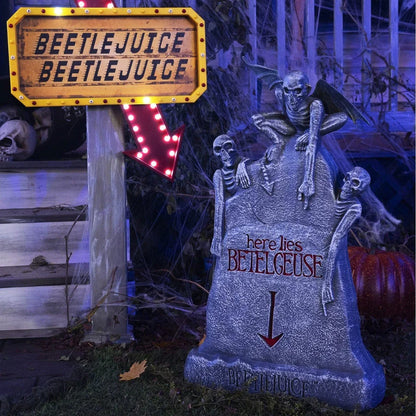 Glowing ghost skull tombstone decor with a spooky, otherworldly glow for Halloween
