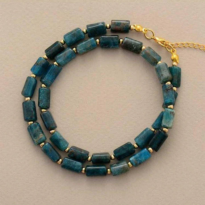 Elegant red natural stone necklace with an adjustable stainless steel chain, perfect for adding a touch of natural beauty to any outfit.