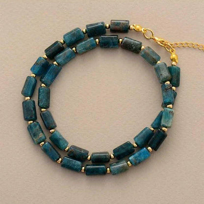 Elegant red natural stone necklace with an adjustable stainless steel chain, perfect for adding a touch of natural beauty to any outfit.