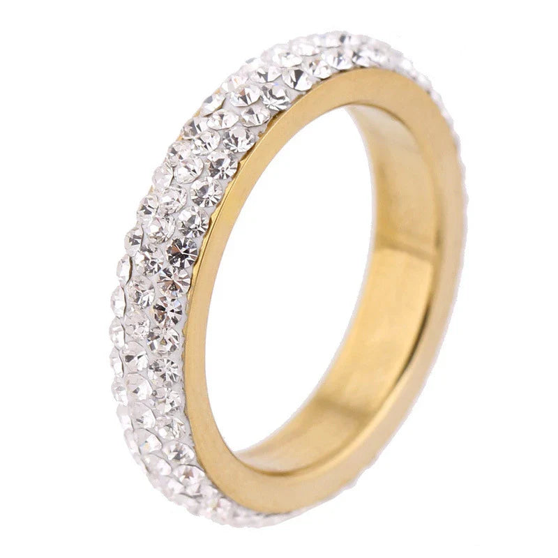 A personalized couple's ring made of stainless steel and adorned with sparkling rhinestones, symbolizing the beauty of your love story.