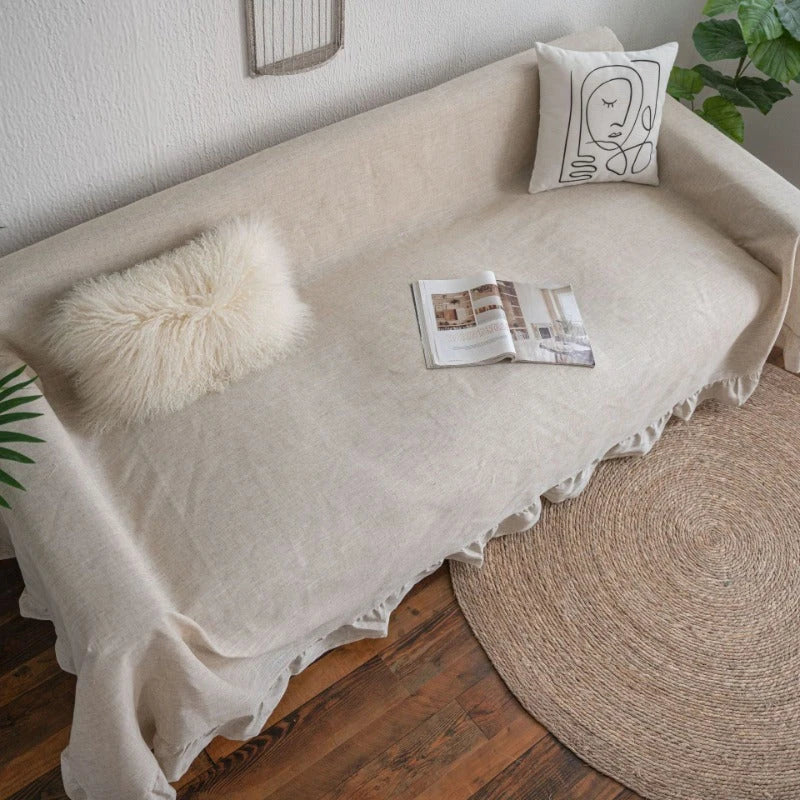 Elegant Ruffled Sofa Cover in Ivory, featuring a sophisticated retro-inspired design that enhances any living room decor