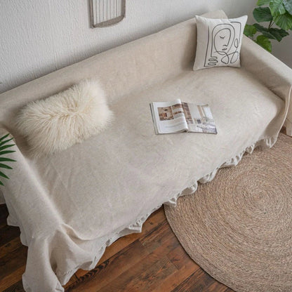 Elegant Ruffled Sofa Cover in Ivory, featuring a sophisticated retro-inspired design that enhances any living room decor