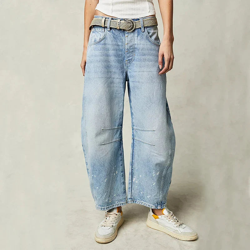 Trendha wide-leg summer pants in light blue, white, and black colors with a relaxed, stylish design