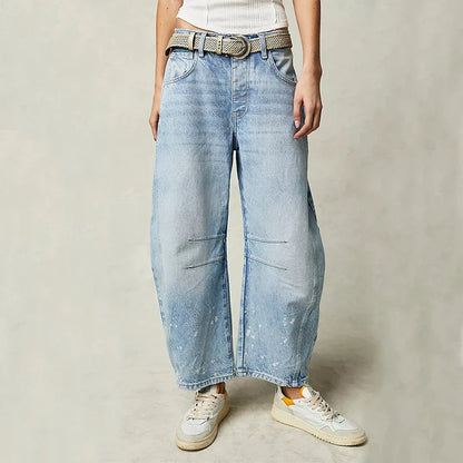 Trendha wide-leg summer pants in light blue, white, and black colors with a relaxed, stylish design