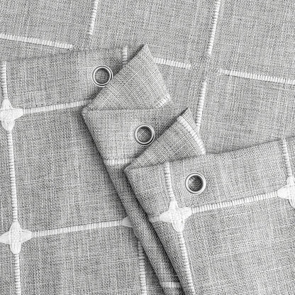 Elegant jacquard linen shower curtain with charming tassels in light grey color, adding sophisticated style to any bathroom