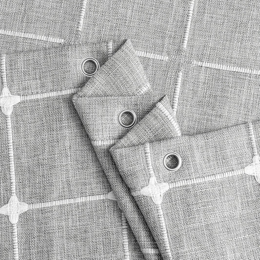 Elegant jacquard linen shower curtain with charming tassels in light grey color, adding sophisticated style to any bathroom