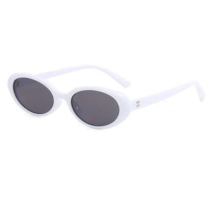 Chic oval sunglasses with white grey acetate frames and polycarbonate lenses, designed for fashionable women to shield their eyes from UV rays in style.