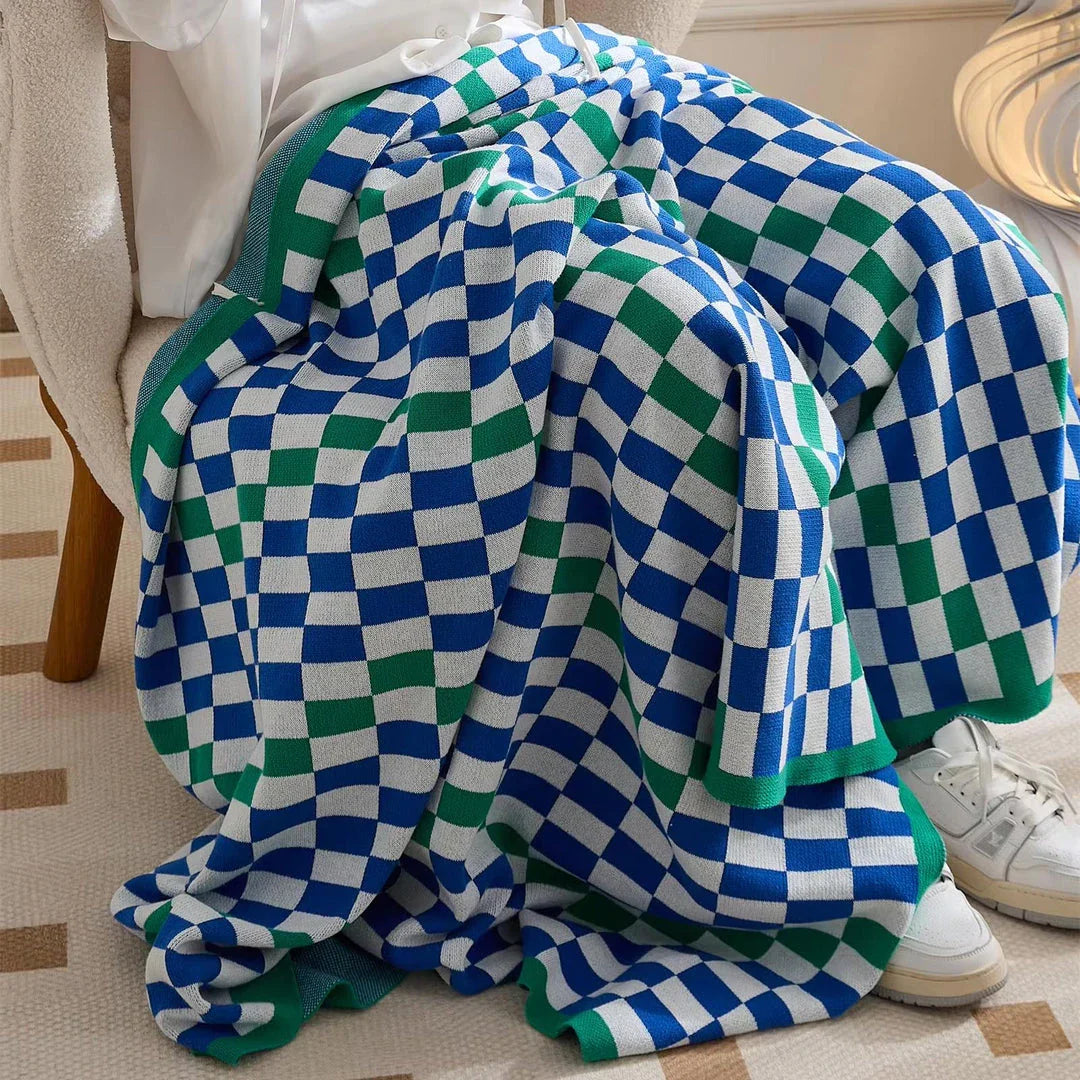 Cozy and stylish plaid blanket in blue, perfect for home decor, travel, and outdoor activities