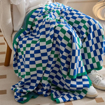 Cozy and stylish plaid blanket in blue, perfect for home decor, travel, and outdoor activities