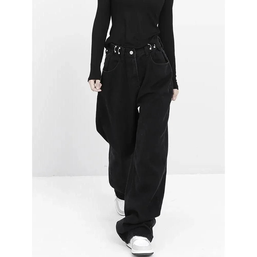 A pair of high-waist black jeans with a relaxed wide-leg design, perfect for effortless style and comfort.