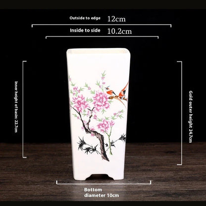 Elegant square ceramic planter in white with a Chinese-inspired design, suitable for indoor plants like asparagus fern and orchid.