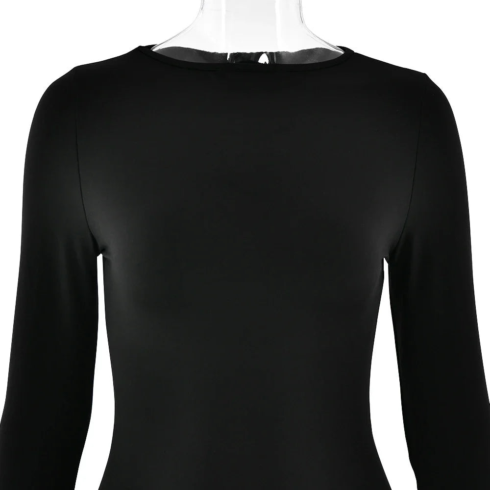 A stylish long sleeve dress with a slim, figure-flattering silhouette and classic round neckline