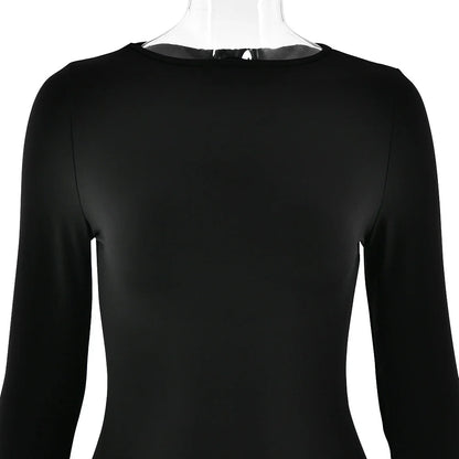 A stylish long sleeve dress with a slim, figure-flattering silhouette and classic round neckline