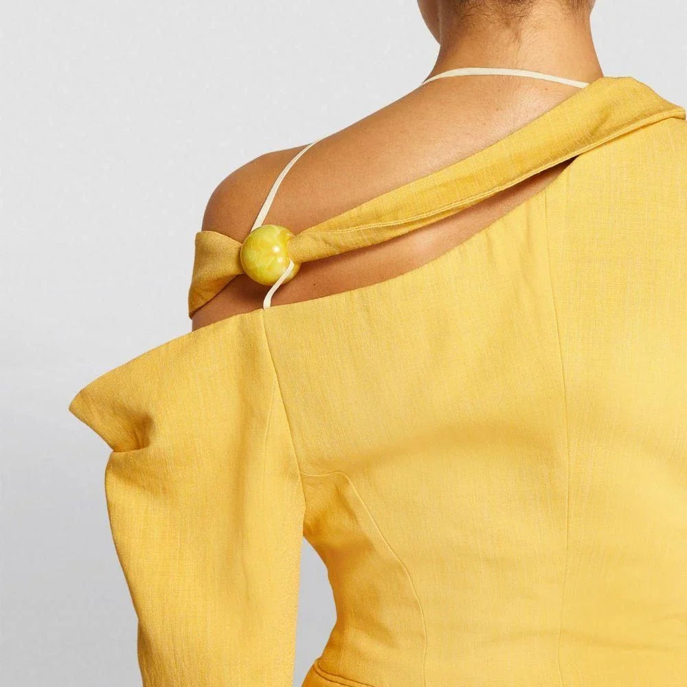 Chic and versatile women's blazer with oblique shoulder, long sleeves, and hollow-out details for a modern, sophisticated look