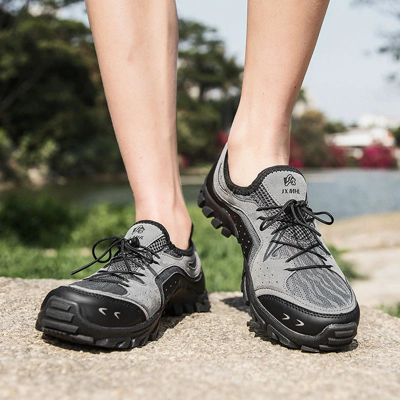 Couple wearing breathable mesh hiking shoes while exploring outdoor trails