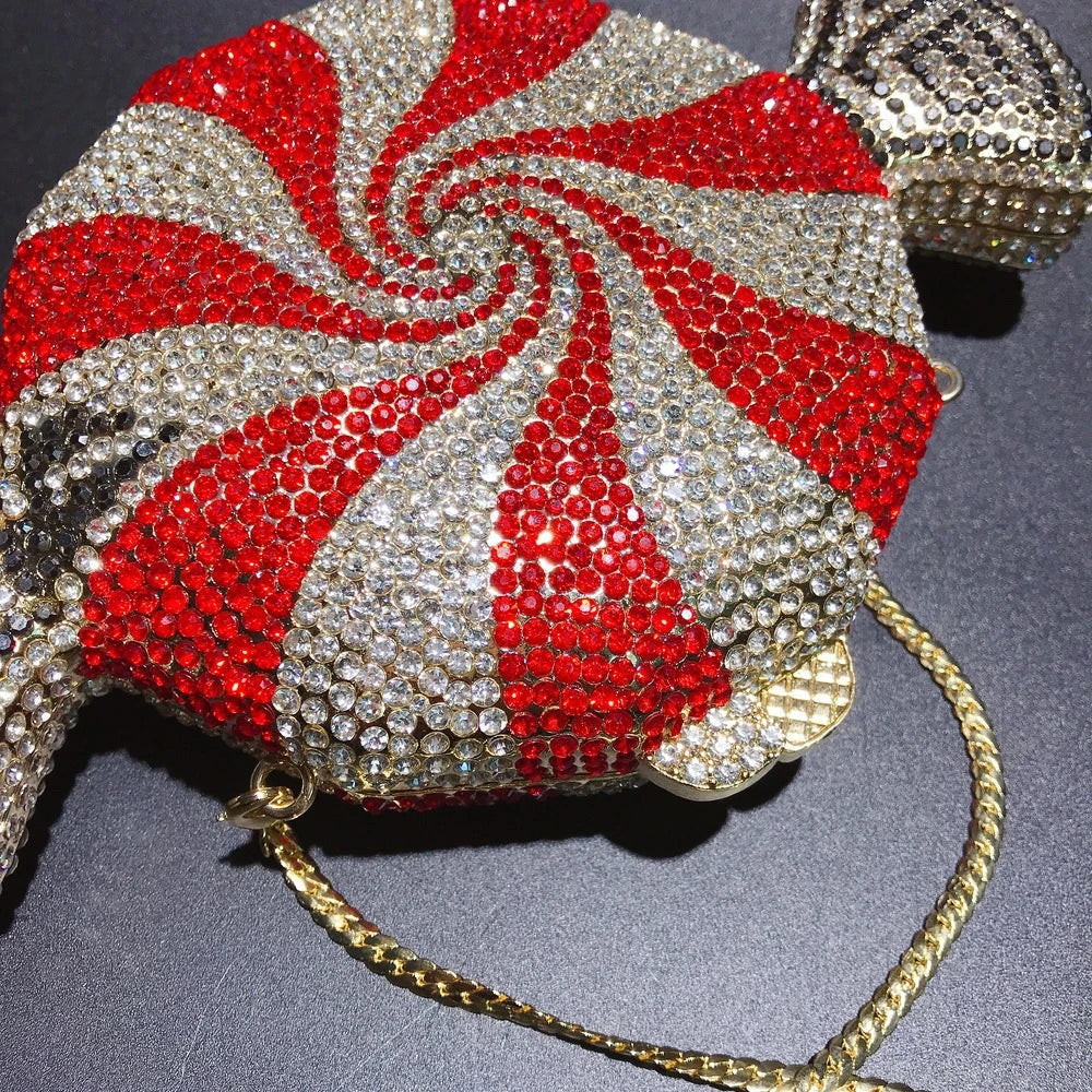 A stylish candy-shaped bag adorned with sparkling rhinestones, featuring a compact and versatile design perfect for everyday use.