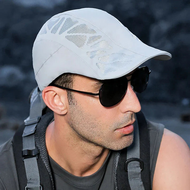 Breathable mesh summer beret cap with adjustable fit, cotton construction, and sun-shielding brim